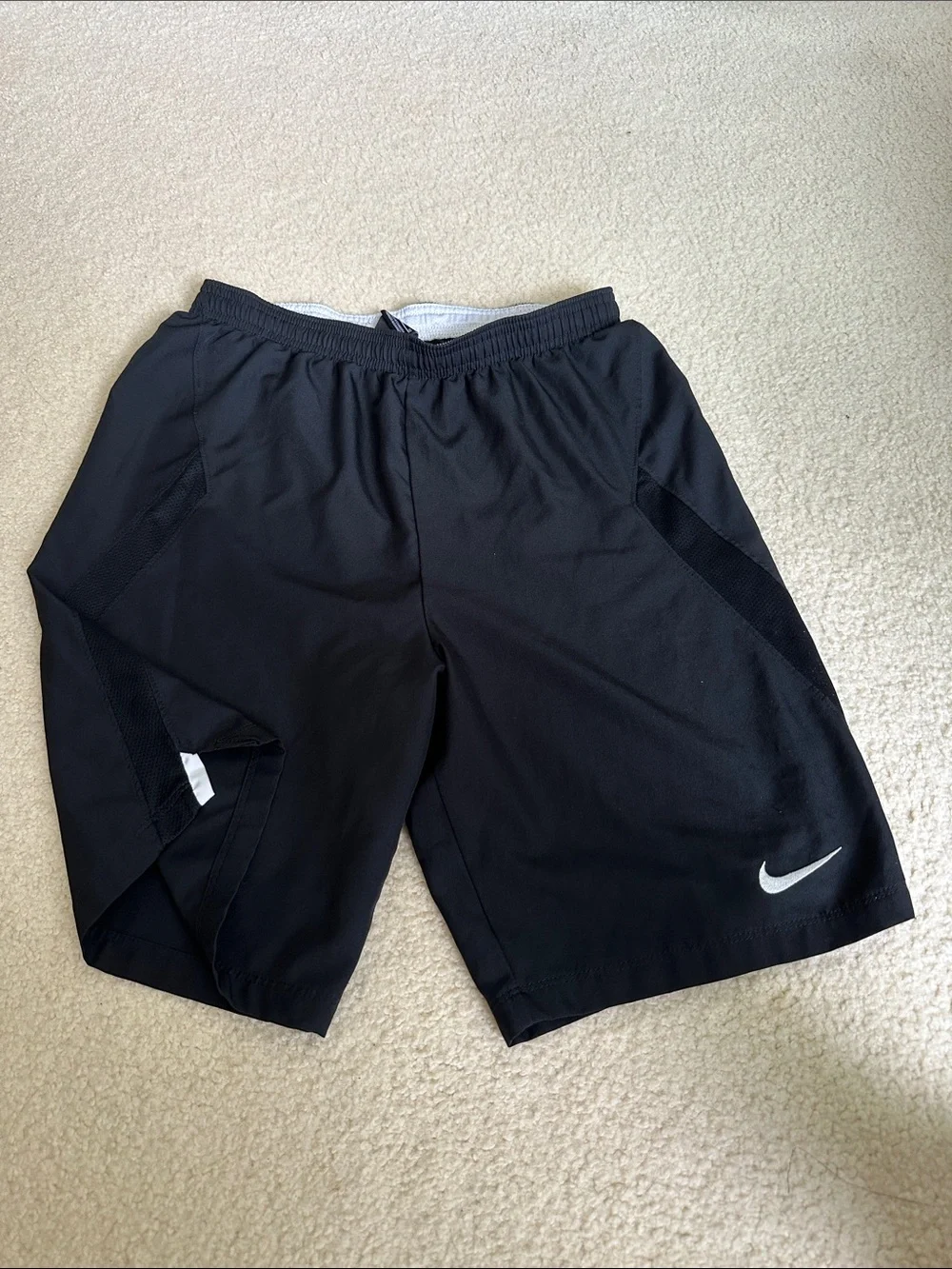 Nike Boys lightweight Black Athletic Shorts with White Swoosh